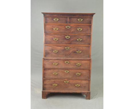 A GEORGE III MAHOGANY CHEST ON CHEST, the upper section with moulded cornice above two short and three graduated long drawers