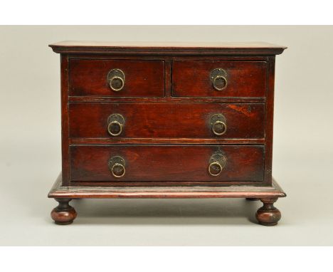 A SECOND HALF OF THE 20TH CENTURY MINIATURE WALNUT AND STAINED CHEST OF TWO SHORT AND TWO LONG DRAWERS, of late 17th Century 
