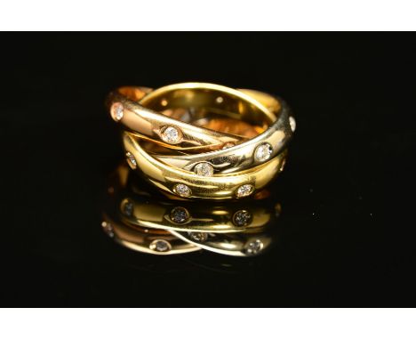 A MODERN PICCHIOTTI 18CT GOLD DIAMOND SET RUSSIAN WEDDING RING, three colour bands each rub over set diamonds, estimated tota