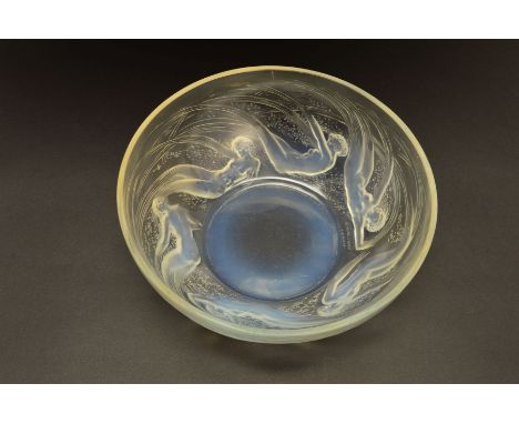 RENE LALIQUE (1860-1945), a circular opalescent bowl in the Ondines pattern, the exterior has relief decoration in the form o