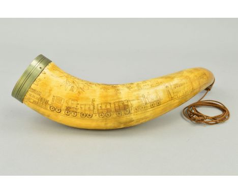 A 19TH CENTURY SCRIMSHAW POWDER HORN, decorated with a steam train named 'Lion' pulling carriages and wagons towards building