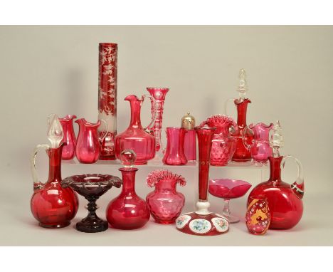 A COLLECTION OF 19TH AND 20TH CENTURY CRANBERRY GLASS, to include decanters, jugs, vases, etc, together with a ruby flash cut