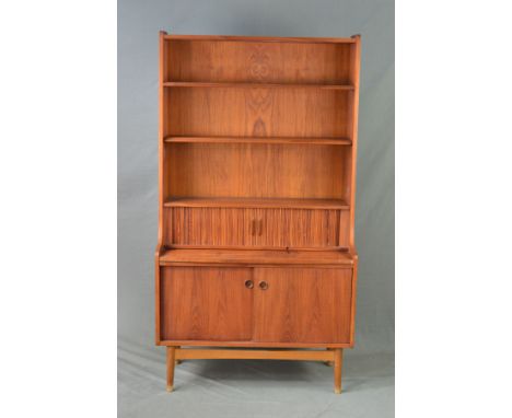 BORGE MOGENSEN, a Danish teak secretaire bookcase, the double open adjustable shelves above tambour front revealing two drawe