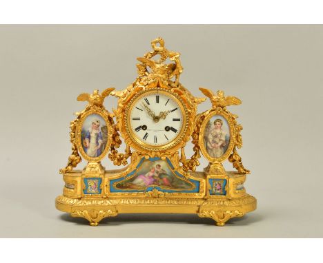 A MID 19TH CENTURY FRENCH ORMOLU AND PORCELAIN MANTEL CLOCK, cast with bird finials, circular enamel dial with retailers mark