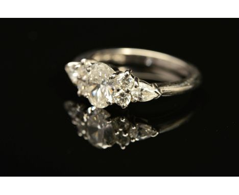 A MODERN PLATINUM DIAMOND DRESS RING, centring on an oval modern brilliant cut diamond, accompanied by a diamond grading repo