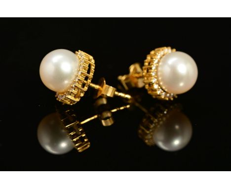 A MODERN PAIR OF 18CT GOLD YOKO CULTURED FRESH WATER PEARL AND DIAMOND STUD EARRINGS, together with certificate of authentici