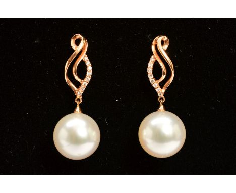 A PAIR OF 18CT GOLD CULTURED PEARL AND DIAMOND DROP EARRINGS, each designed as a spherical cultured pearl suspended from trip