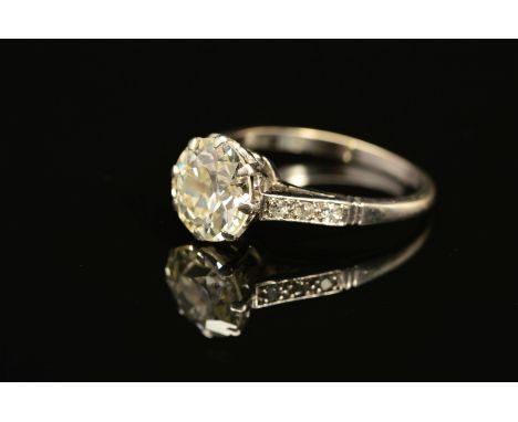 A MID 20TH CENTURY LARGE DIAMOND SINGLE STONE RING, a transitional brilliant cut diamond measuring 9mm in diameter, calculate