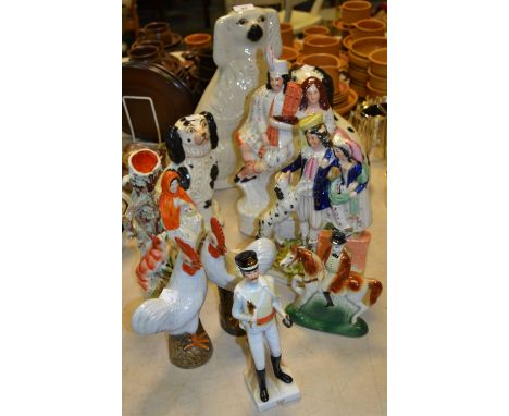 A Staffordshire mantel dog; another pair; a Staffordshire flatback Little Red Riding Hood (faults); Nao figure; etc 