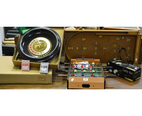 A Jaques roulette wheel , original box and outer casing; a Lucky Ace card dealer; a Chad Valley bagatelle board; a small tabl