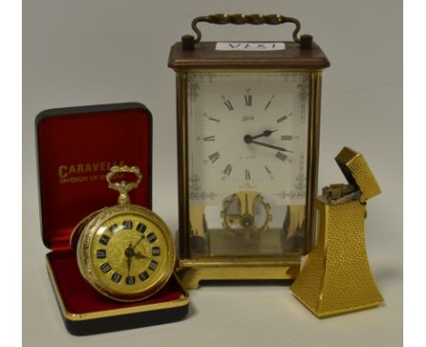 A Schatz 8 day carriage clock; a Solora  pocket watch; a Dunhill gold coloured lighter 