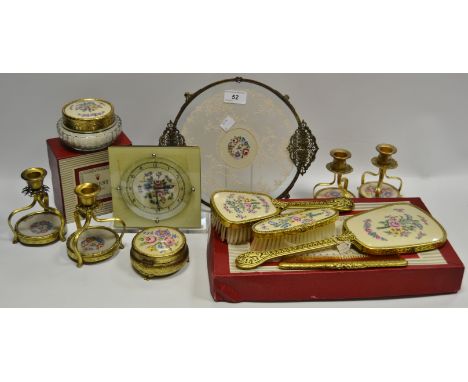 An early to mid 20th century dressing table set, comprising of boudoir candlesticks; hand mirror, clothes brush, hair brush, 