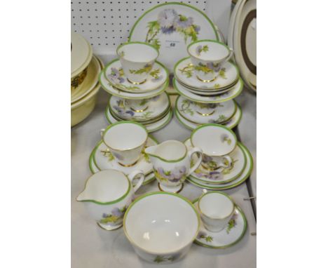 A Royal Doulton Glamis Thistle pattern part tea service and coffee service, signed P Curnock