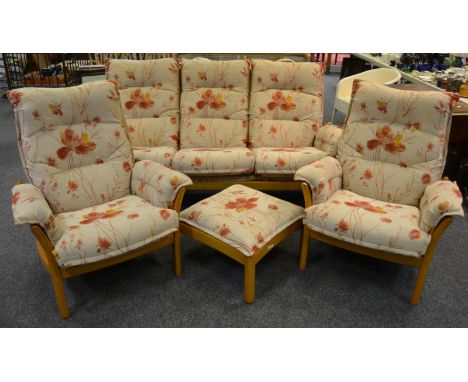A four piece Ercol lounge suite