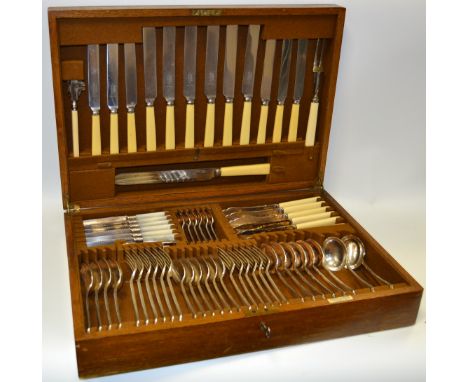 An early 20th century Mappin & Webb oak cased canteen for six, inc carving knife and fork, soup, dessert forks, knives etc, f