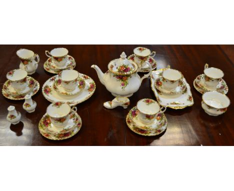 A Royal Albert Old Country Roses tea service, for eight, comprising teacups and saucers, six tea plates, sugar bowl teapot, s