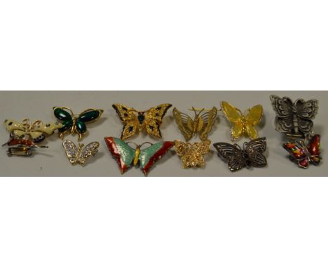 An enamel butterfly brooch;  others, various;  a silver mounted and amber mouse brooch;  etc 