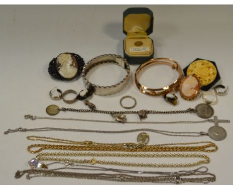 Jewellery - a hinged 9ct rose gold bangle set with white stone flanked by ten red stones weight 9.5g; a cameo brooch; a silve