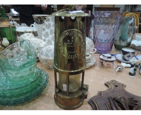 A type 6 M&Q brass Miners Safety lamp by The Protector Light and Lamp Company, Eccles