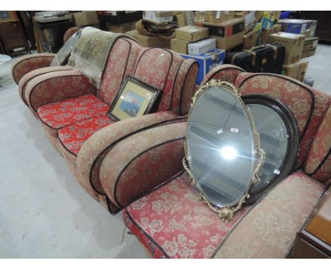 An Art Deco lounge suite finished in floral moquette upholstery
