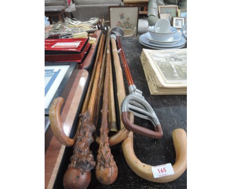 A selection of walking sticks and a shooting stick