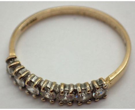 9ct gold half eternity ring set with seven CZ stones size R 1.8g