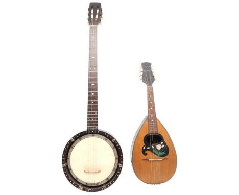 A W Temlett London six-string banjo guitar with the nut and saddle set up as a four string, and also an eight string mandolin