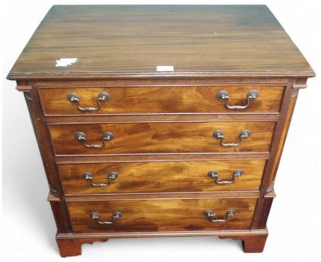 A 20th century mahogany chest of drawers with four graduating drawers with brass drawer pulls on bracket feet, 75cm high x 74