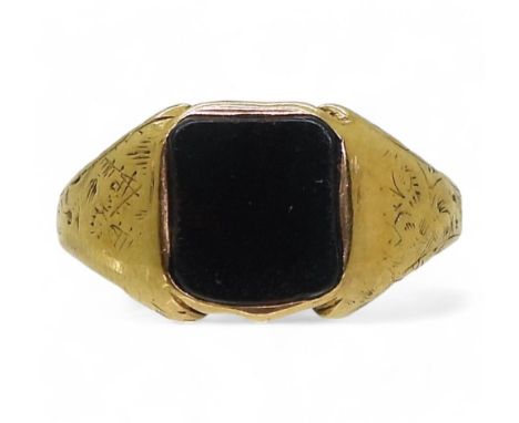 A bright yellow metal signet ring set with a bloodstone, size L1/2, weight 3.6gms Condition Report:Available upon request