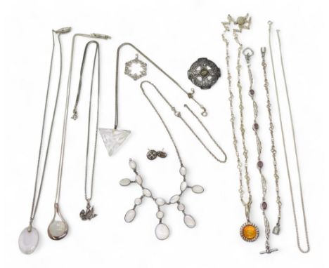 A collection of silver and white metal jewellery to include items set with amber, Galway crystal,&nbsp; moonstone (af) and a 