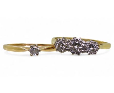 An 18ct gold three stone ring, with illusion settings set with estimated approx 0.35cts size, P1/2, and a 14k gold solitaire&