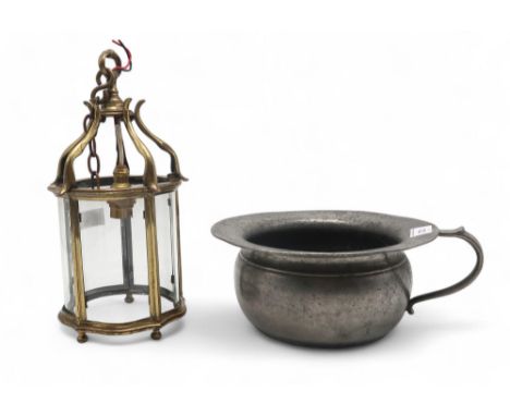 An 18th century pewter chamber pot, marked HH GS to handle and with touch mark GvG under a crown and an Edwardian brass hall 