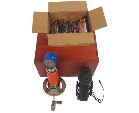 A blue Spark diaphragm cardioid condenser microphone, a Rode SVM microphone, and small box of parts to include Epiphone humbu