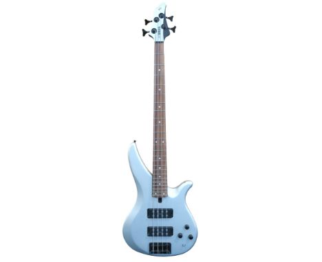 A Yamaha RBX-374 electric bass guitar, with&nbsp;24 frets and a silver double cutaway body Condition Report:Available upon re