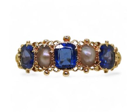 A Victorian blue gem and pearl ring,made in bright yellow metal, size Q1/2, weight 2.1gms Condition Report:No hallmark, blue 