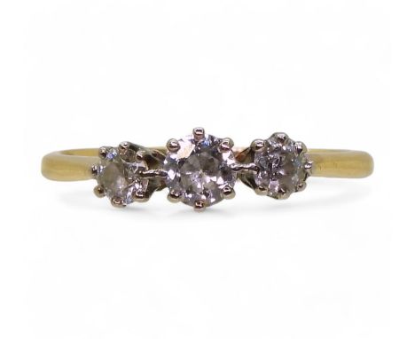 An 18ct gold three stone diamond ring, set with three old cut diamonds with an estimated approx diamond carat total of 0.50ct