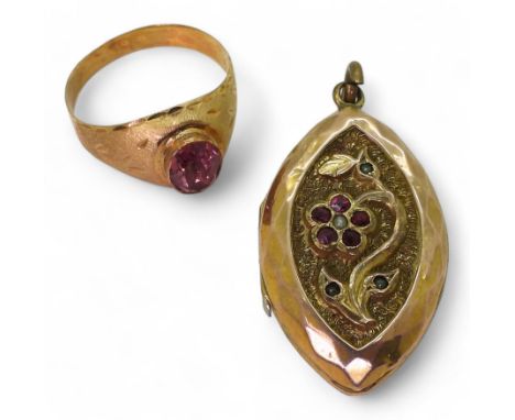 A yellow metal back &amp; front locket together with a bright yellow metal ring, weight together 9.6gms Condition Report:Avai