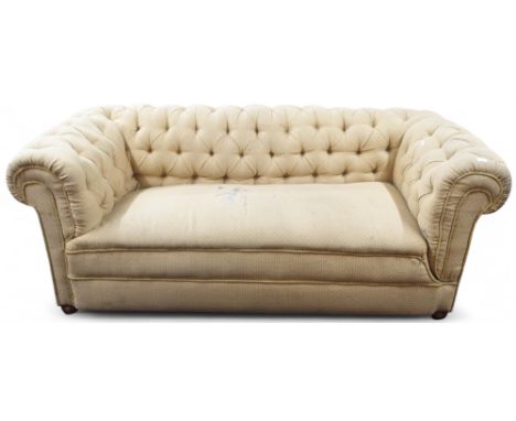 A 20th century mustard upholstered Chesterfield style drop end sofa, 79cm high x 204cm wide x 92cm deep Condition Report:Avai