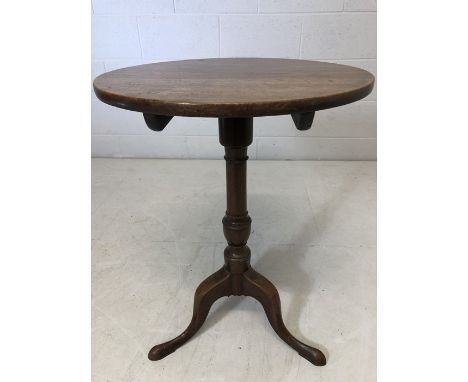 Circular pedestal table on tripod feet.  Approx diametre 52cms 