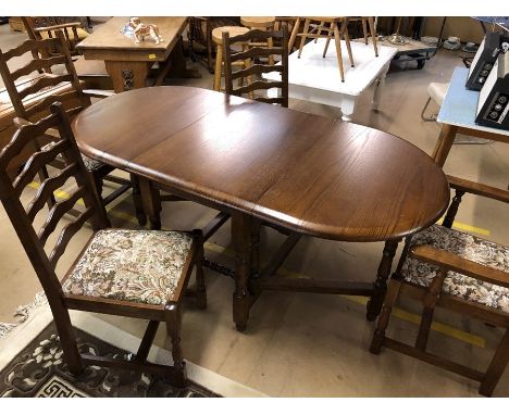 Drop leaf dining table with four ladder back chairs with upholstered seats, including two carvers, table approx 175cm x 89cm 