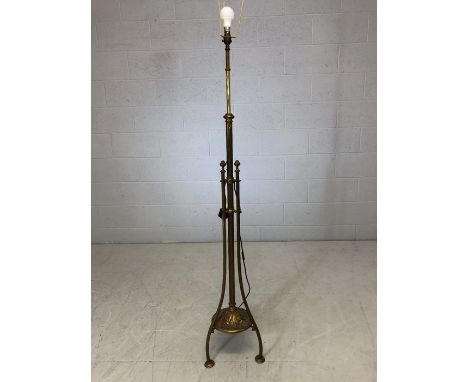 Brass tripod standard lamp with leaf design to base