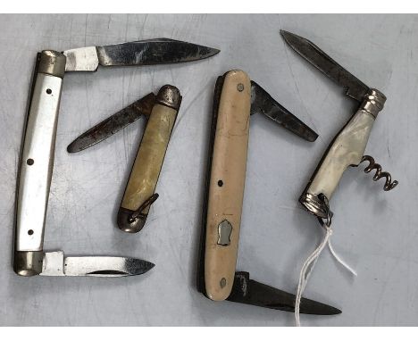Four vintage folding fruit knives /pen knives