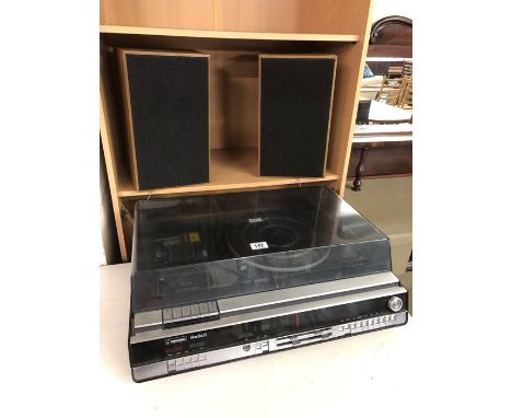 FERGUSON STUDIO 15 MUSIC CENTRE with a record deck and cassette player and with a radio tuner below, together with a pair of 