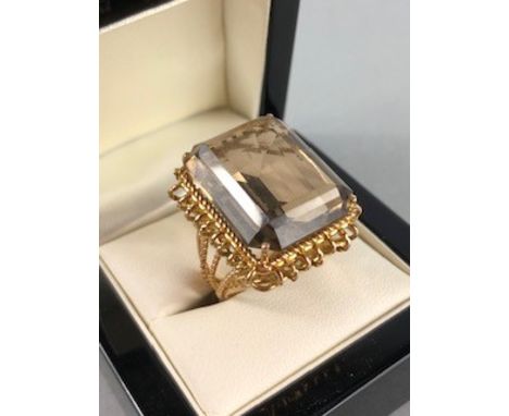 Wire work unmarked Gold ring set with a single large Emerald cut pale yellow Citrine approx. length 23.2mm x width 17.9mm 