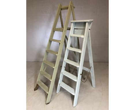 Two vintage painted step ladders the largest approx 166cms tall 
