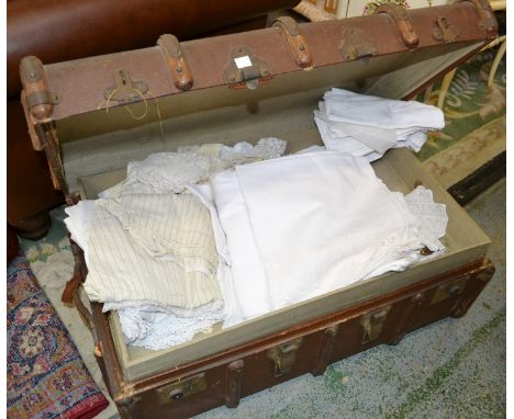 Textiles - Embroidered tablecloths, laced edged linen, crochet, lace, etc in a Birch Foundation travel trunk.