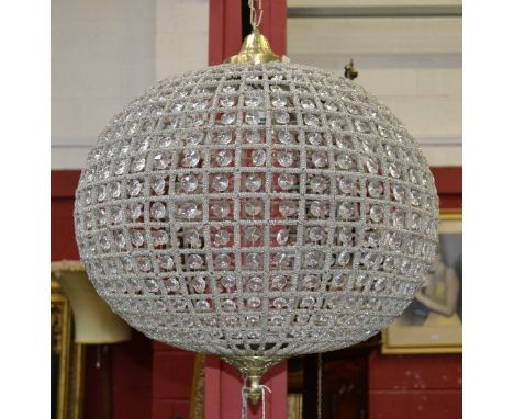 A crystal ball shaped chandelier with gilt metal mounts.
