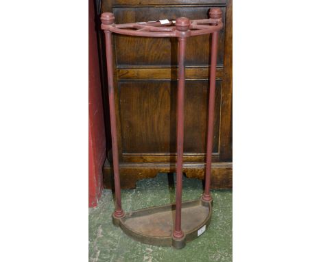 A cast iron stick stand.