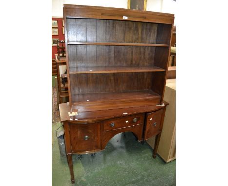 A Regency reproduction mahogany bowfront sideboard, crossbanded top, single drawer flanked by panelled door cupboards, brass 