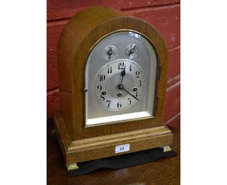 An early 20th century Junghans oak bracket clock, the silvered dial with Arabic numerals, subsidiary Chime/Silent and Slow/Fa